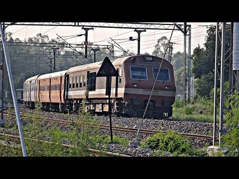 View of the Katra-Srinagar railway line with a train passing through scenic valleys, symbolizing enhanced connectivity to Jammu and Kashmir.